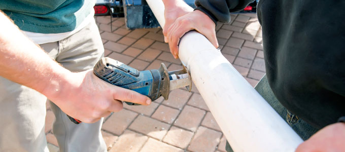 water pipe being cut during water service installation